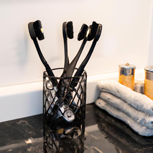 Keep your toothbrushes organized and prevent bacterial growth with a black toothbrush holder.
