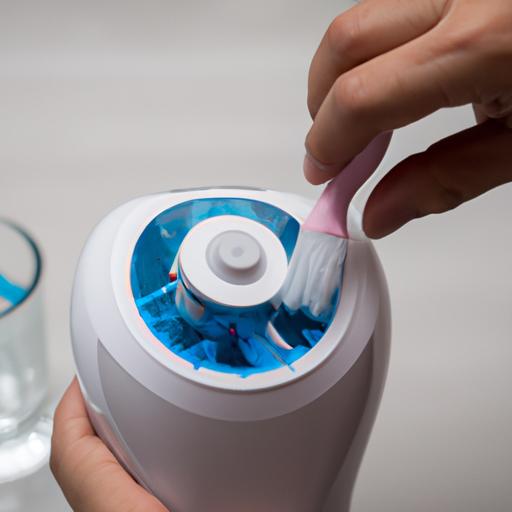 A person taking care of their Philips Sonicare Water Flosser by cleaning and maintaining it regularly to ensure optimal performance and longevity.