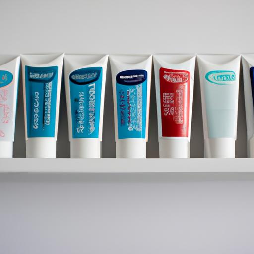 Different variants of Sensodyne toothpaste lined up on a bathroom shelf.